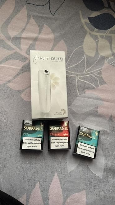 şəxsi əşyalar: Ploom Aura (Glacier White) tütün qızdırma cihazı və Sobranie sticks — 1