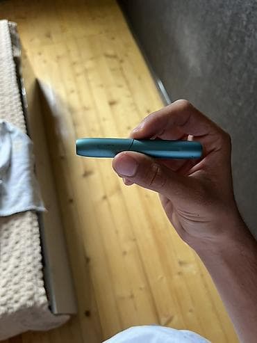 IQOS cihazı – tütün çubuqlarını qızdırma texnologiyası ilə istifadə — 2