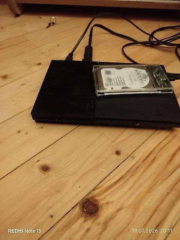 iphone 3 pro: PlayStation 2 Slim (PS2) oyun konsolu + xarici USB sərt disk 500GB - — 2
