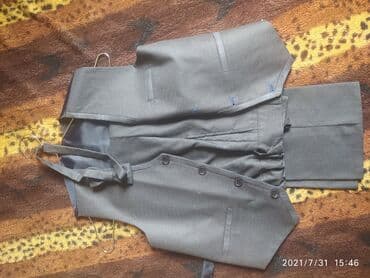 Костюм тройка на 7-9 лет с бабочкой. Одевался 1 раз на свадьбу