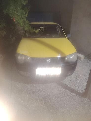 tesla disk: Fiat Albea sedan - Rəng: sarı (qara bamperlərlə) - Kuzov: 4 qapılı — 1