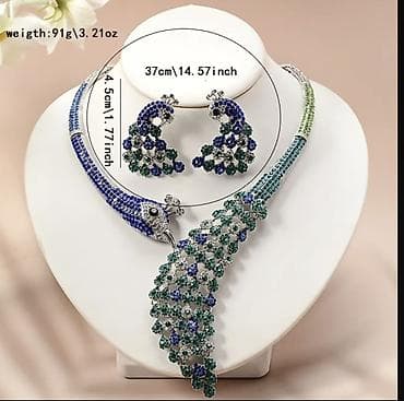 Сумки: Təsvir: - Zümrüd-yaşıl və safir-mavi daşlarla bəzədilmiş tovuzquşu — 3