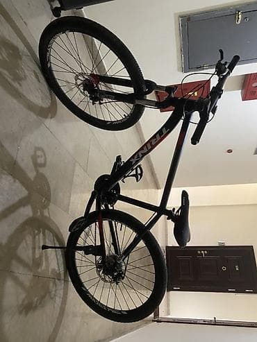 Trinx dağ velosipedi - Gödəkçə: Alüminium 6061 (üzərində “Designed in