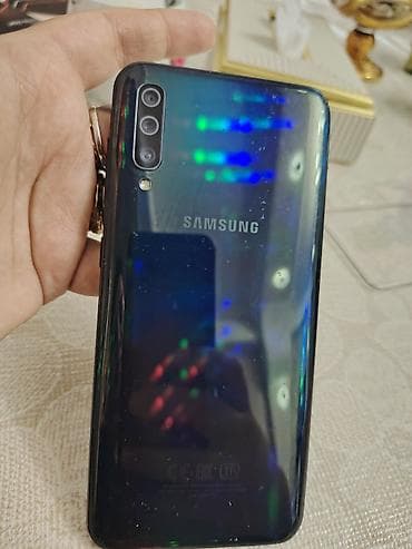 xbox series s disk: Samsung Galaxy A50, Barmaq izi, İki sim kartlı, Face ID — 2