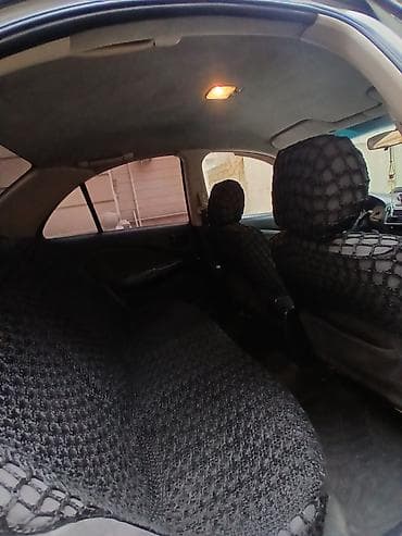 ford focus 2001: Nissan Sunny: 1.3 l | 2007 il Sedan — 5