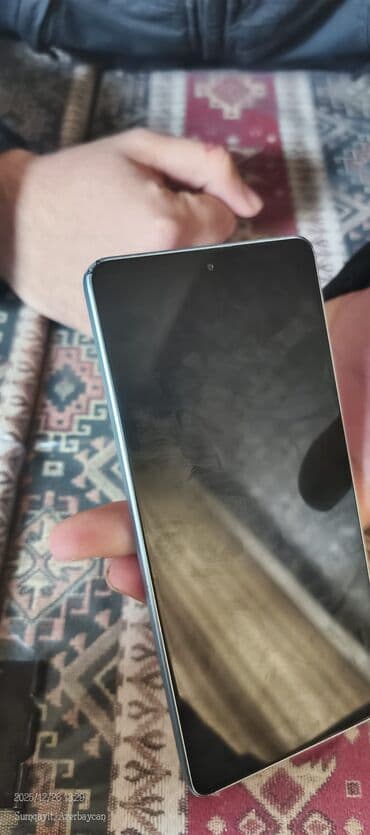 Фото и видеокамеры: Xiaomi 15, 256 ГБ, цвет - Голубой, 
 Отпечаток пальца, Face ID — 2