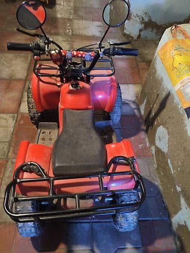 katalka uşaq motosikli: Uşaqlar üçün benzinli mini ATV/kvadrosikl Xüsusiyyətlər: - Gövdə — 4