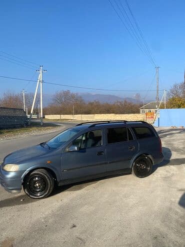 oka satılır: Model: Opel Astra Caravan (universal kuzov) Rəng: tünd boz Yanacaq — 9
