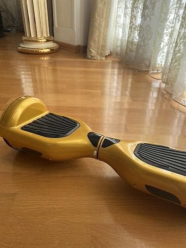 Elektrik nəqliyyatı: Qızılı rəngdə hoverboard (özünü tarazlayan skuter) Bele istemir amma — 4