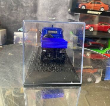 metbex tavan modelleri: Коллекционная модель Mercedes-Benz Unimog U411 Technical Relief blue — 8