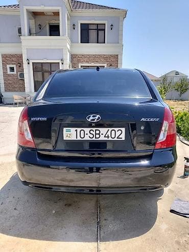 multi sukan: Hyundai Accent: 1.4 l | 2008 il Sedan — 2