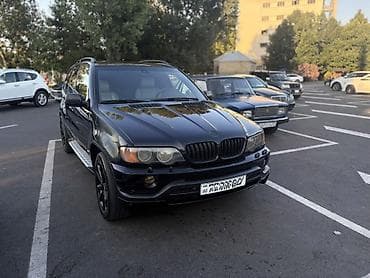 bmw salonu: BMW X5 (E53) – qara rəng, tam ölçülü premium SUV Texniki və dizayn — 2