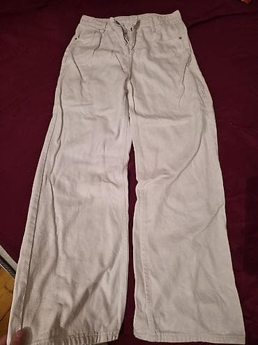 Ağ rəngli geniş kəsimli şalvar - Rəng: ağ/ekru - Kəsim: düz, geniş