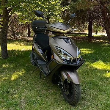 moto kavasaki: Skuter – QUANTUM C8S (benzinli) Xüsusiyyətlər: - Aqressiv dizaynlı ön — 2