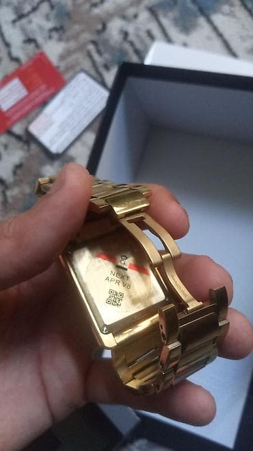 bil: Brend: Cartier (qutu və aksesuarlarla) Model: Düzbucaqlı kadranlı — 6