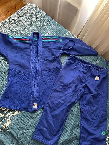 Мужская одежда: Məhsul: Judo kimono dəsti (yuxarı gödəkcə + şalvar) Xüsusiyyətlər: - — 1