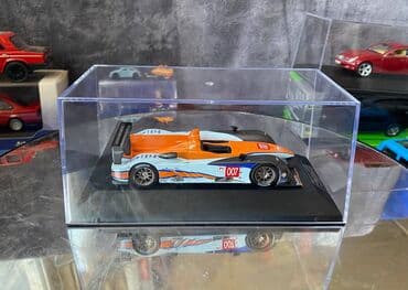 где можно продать марки: Коллекционная модель Aston Martin AMR-One #7 Gulf Team LeMans 2011 — 8