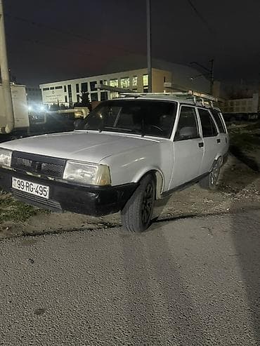 13 disk: VAZ 2104 universal, ağ rəng. - Kuzov: 5 qapılı universal kuzov, iri — 2