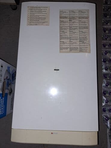 seyf qapilar islenmis: İşlənmiş Kombi 32 kVt, Ünvandan götürmə — 2