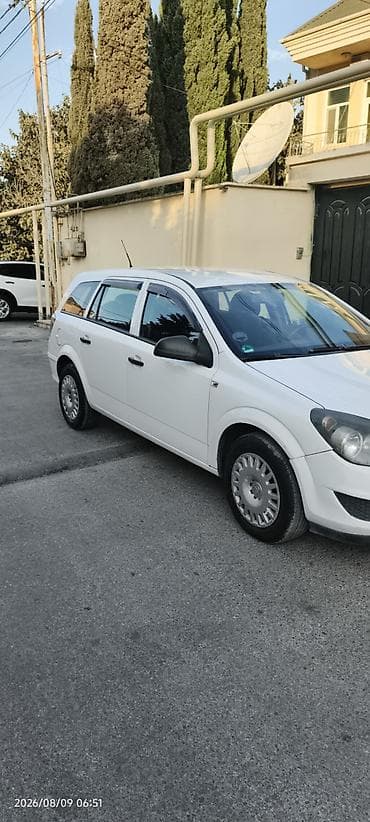 audi a6 2000: Opel Astra Caravan (Universal) – ağ rəngdə, ECOTEC mühərrikli — 6