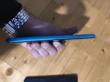 telefon divar kağızları qara: Məhsul: Xiaomi Redmi smartfon (mavi rəng) Xüsusiyyətlər: - Korpus — 3