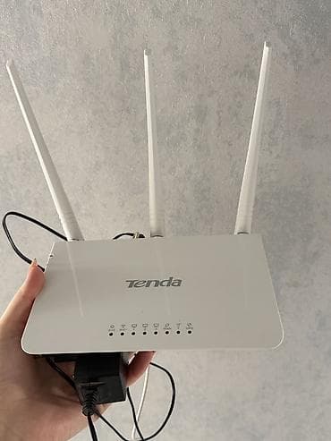 Tenda simsiz Wi‑Fi router Xüsusiyyətlər: - 3 ədəd yüksək qazanclı