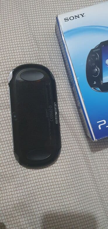 psp vita qiymeti: Sony ps vita 16 gb kart, fifa 15 oyun, qutu adapter, şnur hamısı — 2