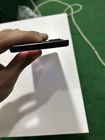 telafonlar: Xiaomi Redmi 5G smartfon - Arxa tərəfdə “Redmi 5G” loqosu və 50 MP — 3