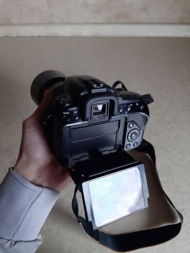 knopkalı: Fotoaparat Sony a500. Probeqi azdır. Şəkil çəkmək üçün knopkası — 3