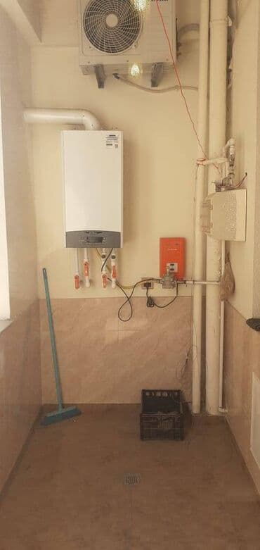 tam temirli menziller: İnşaatçılar metrosunun çıxısında inşaat binasında 12 mertebeli — 8