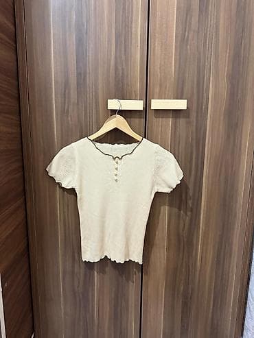 ana bala geyimi: Xs s m razmerler her biri 5 azn Qadın geyim dəsti – 4 məhsul 1) Ağ — 7