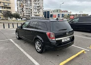opel astra 2017: Opel Astra H Caravan (universal) – qara rəngdə, 5 qapılı şəhər və ailə — 4