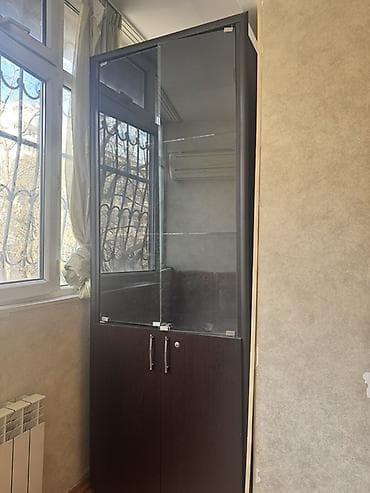 Şüşəli dolab vitrini, İşlənmiş, Ünvandan götürmə