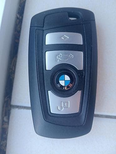 BMW uzaqdan idarə olunan açar (smart key/fob) - Markalı BMW düyməli — 1