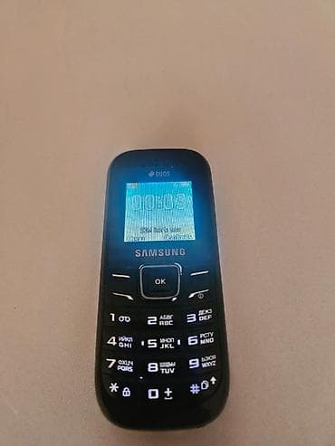 philips xenium x530: Samsung E1252, 16 GB, rəng - Qara, Düyməli — 2