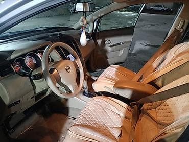 cd disklər: Nissan Tiida, 5 qapılı hetçbek, gümüşü rəng. - Sərfəli şəhər — 7