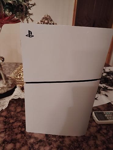 the order: Ps 5 slim satılır 2 djostik ilə, ideal vəziyyətdədir, içinde 600 — 2