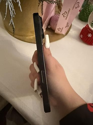 BMW: IPhone 16 Pro, 128 GB, Qara, Face ID — 6