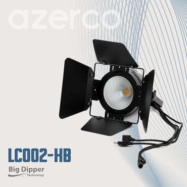 Qara rəngdə, dairəvi formalı işıqlandırma cihazı. Cihazın ön — 2