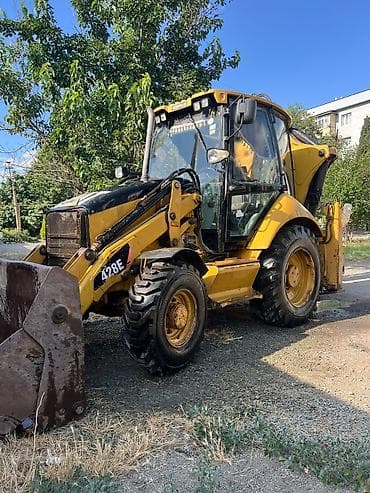 mini yer sumlayan: Caterpillar 428E ekskavator-yükləyici - Marka/model: Caterpillar 428E — 4