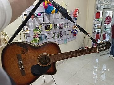 gitara balaca: Kəsikli ispan gitar çantasıda var 1 ədəd 1nci tel qırılıb baha — 1