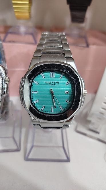 elektrikli saat: Patek Philippe tərzində analoq qol saatları – klassik Nautilus dizaynı — 6