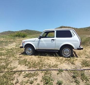 nissan tiida yan guzgu: VAZ (LADA) 4x4 Niva: 1.7 l | 1999 il 153624 km Sedan — 3