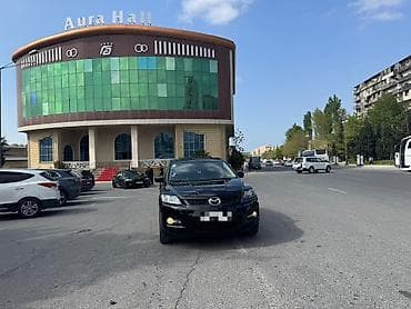 Mazda CX-7: 2.3 л | 2007 г. Кроссовер — 4