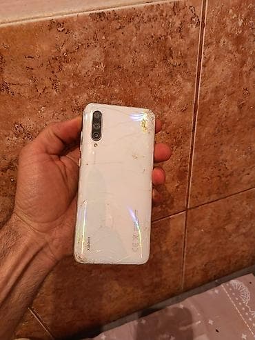 samsung c5212 satilir: Xiaomi A3, rəng - Ağ, 
 Barmaq izi — 2