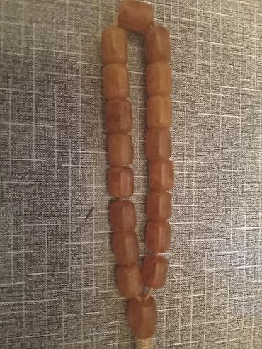 Kəhrəba rəngli təsbeh - Material: kəhrəbaya bənzər, yarı şəffaf