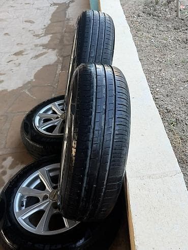 disk 14: Nissan orijinal yüngül lehimli disklər və şinlər komplekti - — 1