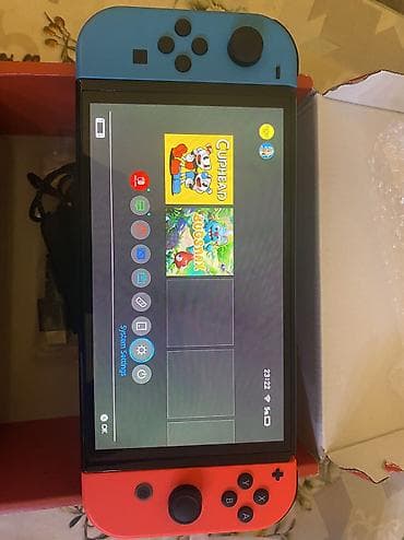 Nintendo Switch Oled 64 GB az işlenmiş üstünde iki dene 70 manatlıq — 2