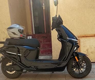 электрический скутер: Sənədləri qaydasındadır,tam şarj ilə 77 km gedir,sürət sənəddə 45 km — 5