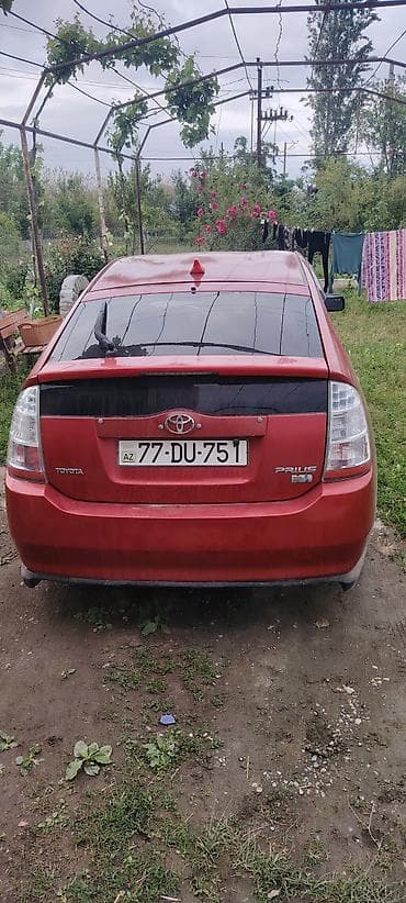 daewoo nexia 2010: Toyota Prius (2-ci nəsil) hibrid hetçbek - Rəng: qırmızı - Kuzov: 5 — 9